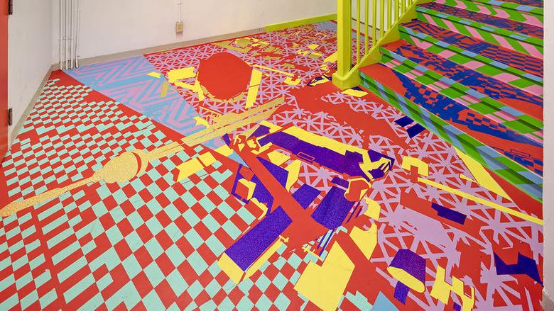 A brightly-colored art installation in a stairwell